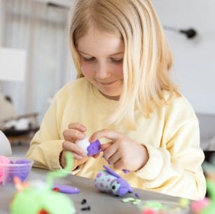 Collage picture - Little girl playing with modeling clay