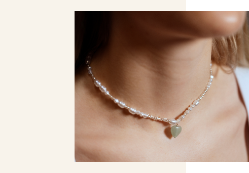 Model with jewelry necklace on made with crystals