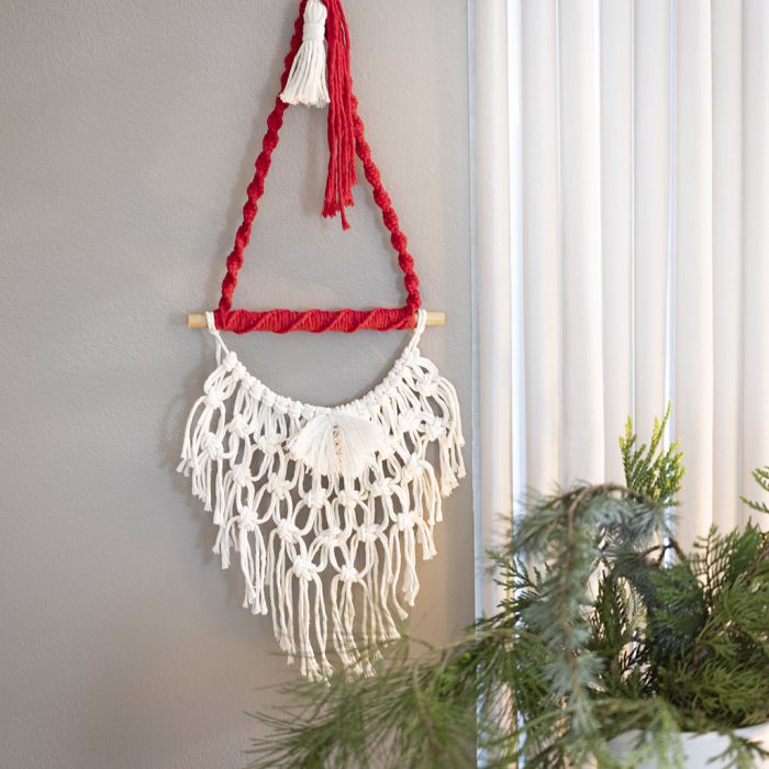 Knotted macramé Santa for hanging