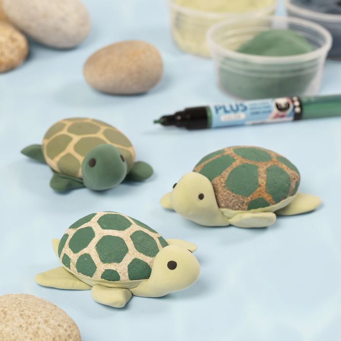 Turtles painted on stones with Plus Color markers and Silk Clay®