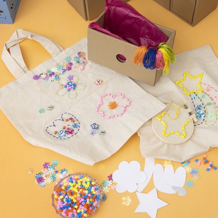 Tote bags decorated with embroidery and beads