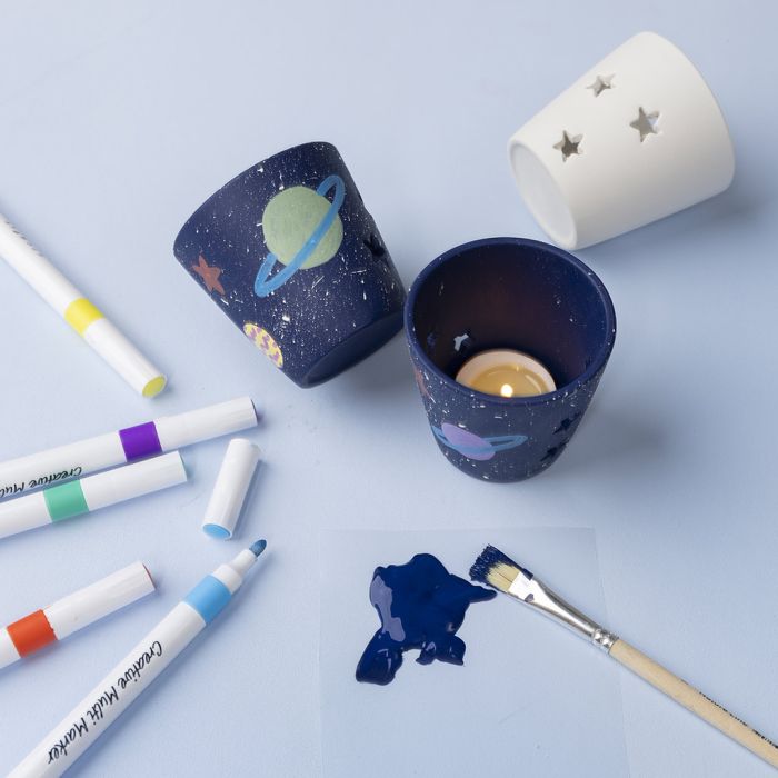 Tealight holders with stars and planets