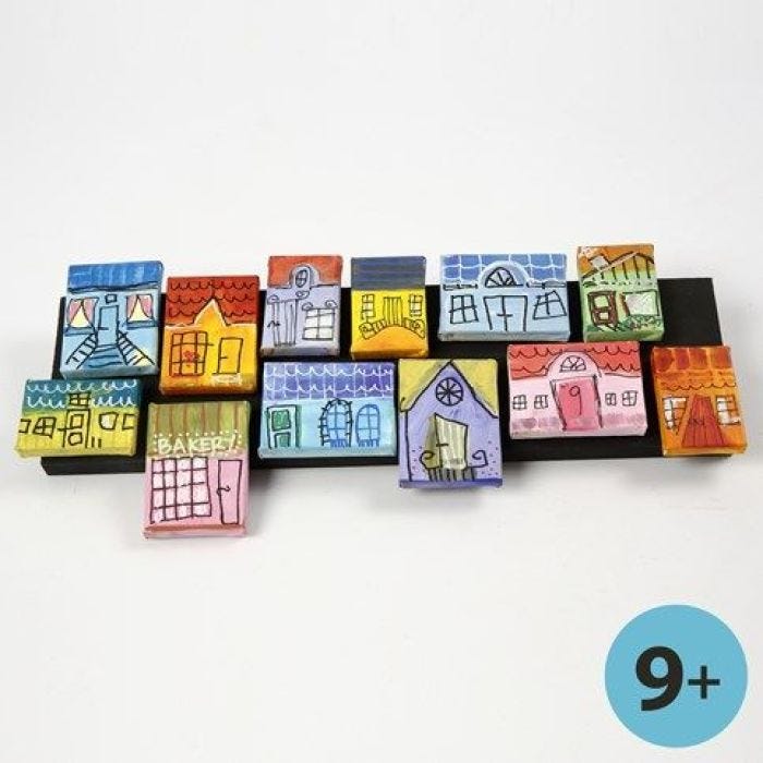 Canvases with Townhouses as a Collage on a Strip of Wood