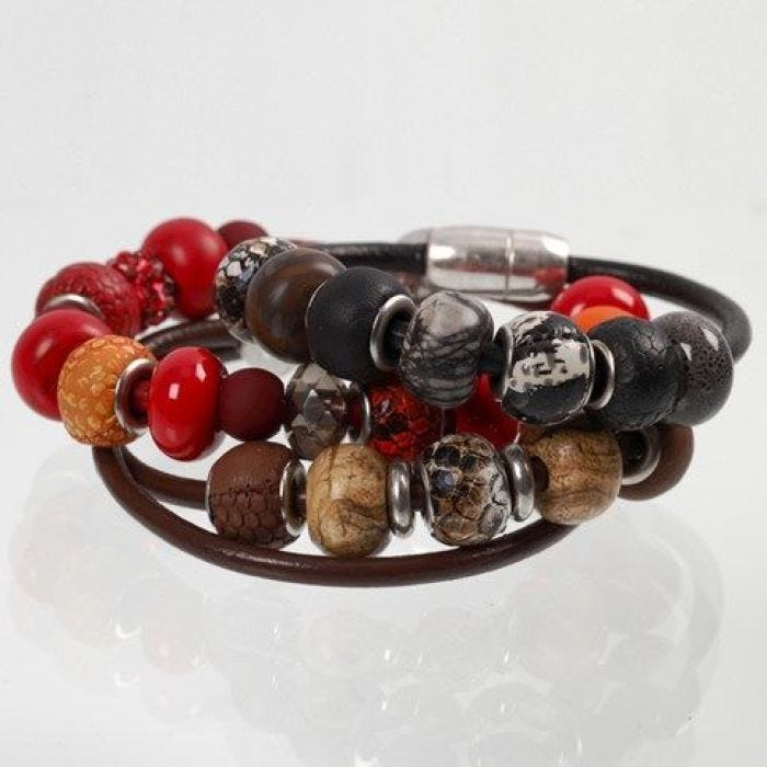 A thick Leather Cord Bracelet with Links and Spacer Beads