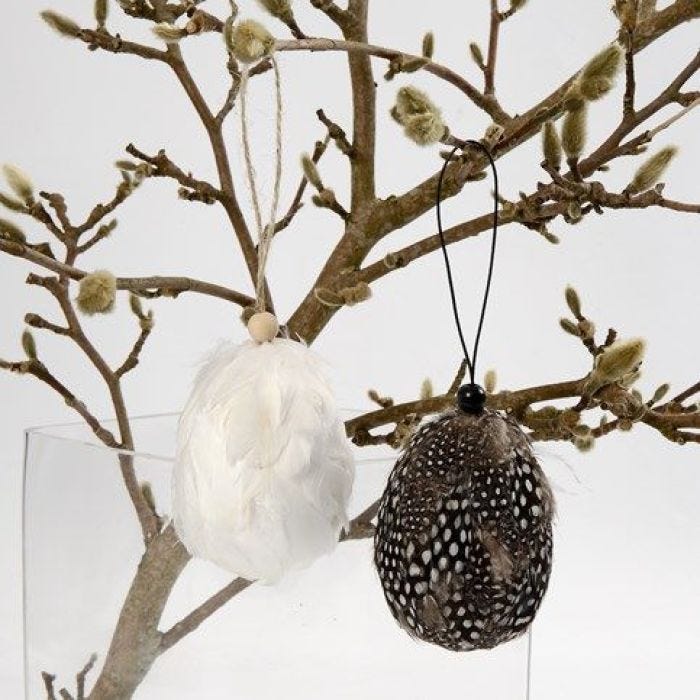 Hanging Eggs with staggered Guinea Fowl Feathers