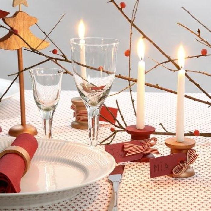 Painted wooden Bobbin Place Cards with Candles and tied-on Ribbon