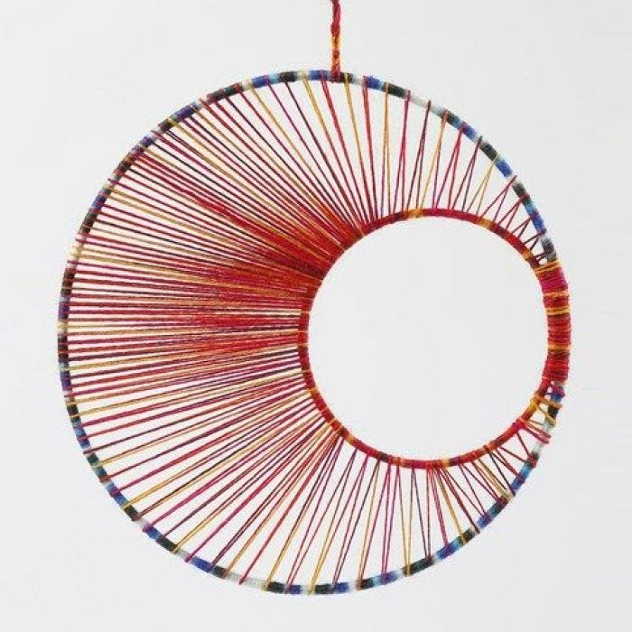 String Art – a Mobile made from Metal Rings with Yarn