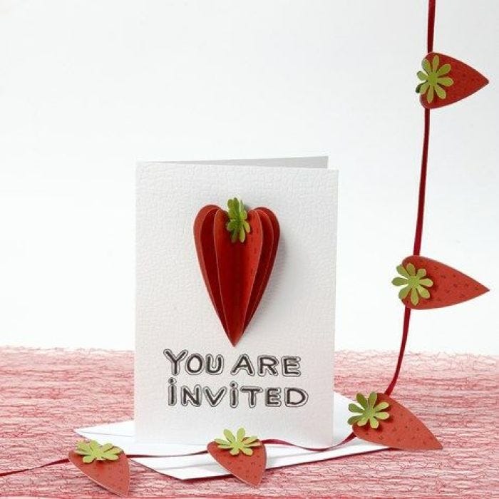 An Invitation decorated with 3D Strawberries from textured Paper