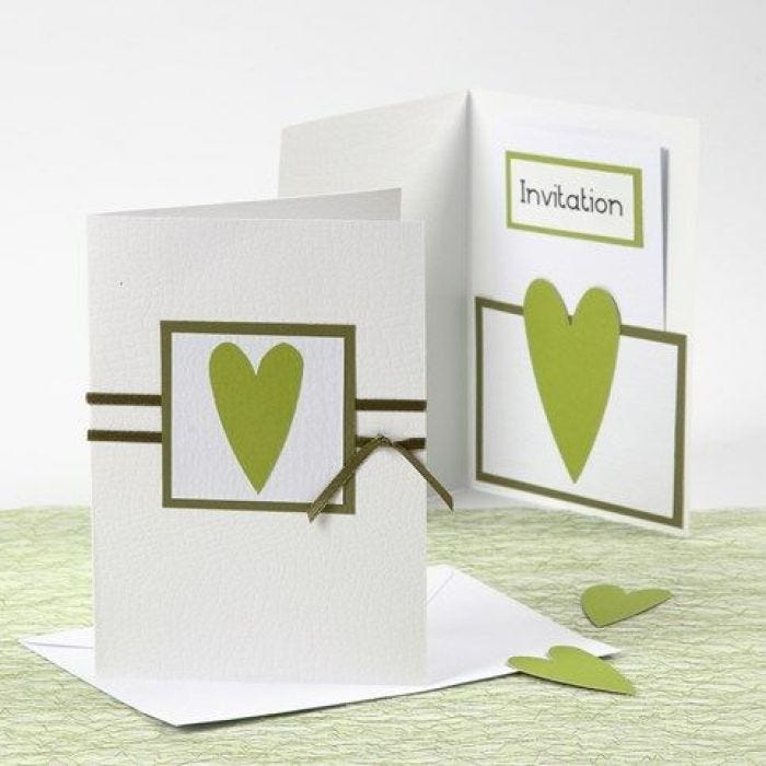 A white and green Happy Moments Invitation and Menu Card