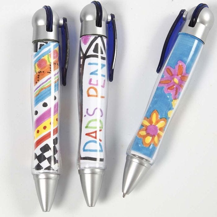 Pens with Drawings under a transparent Cover