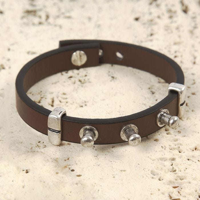 A Bracelet made from a Leather Strap with Metal Studs