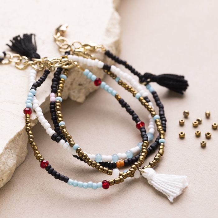 A Bracelet with Rocaille Seed Beads, Faceted Beads and Tassels