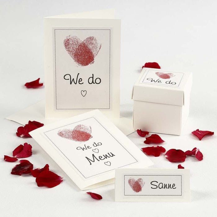 A Wedding invitation & Table Decorations with Fingerprint Hearts