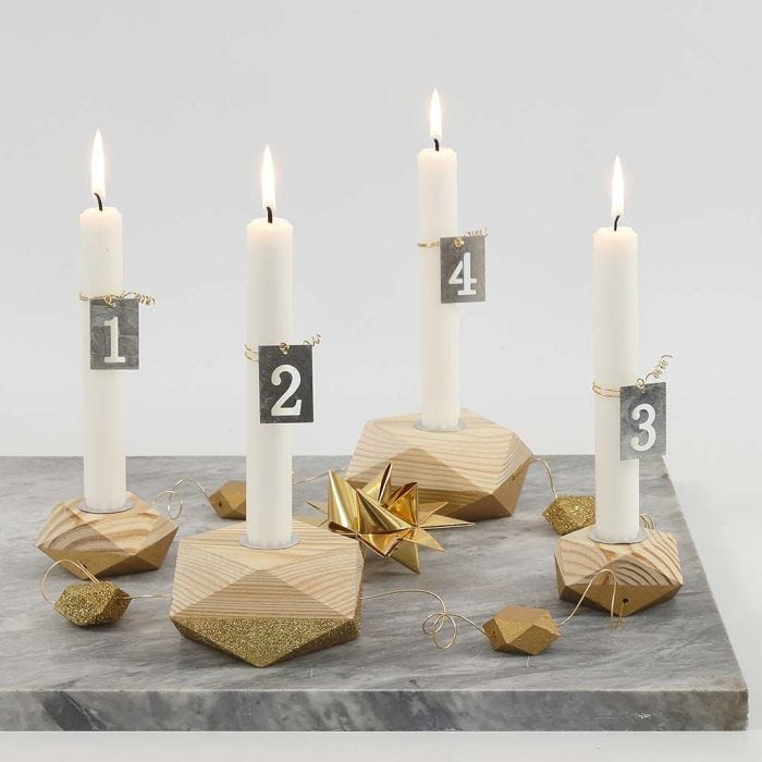Four wooden Candle Holders for Advent partially painted in Gold