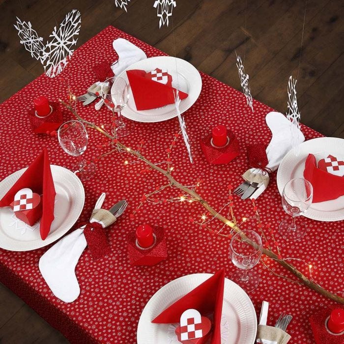 Decorating a red and white Christmas Table