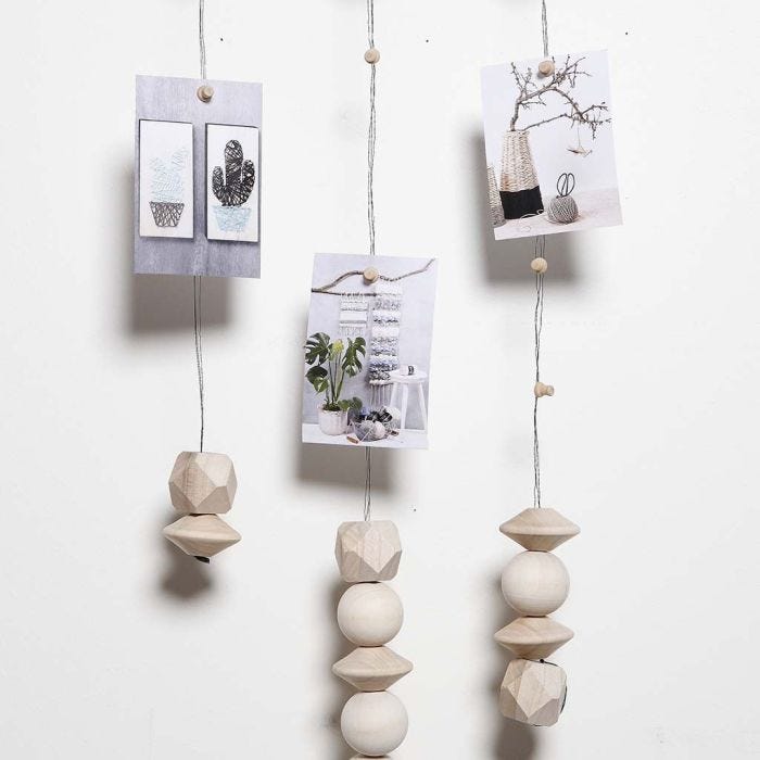 A Mobile made from Florist Wire with Magnets for hanging Photos etc.