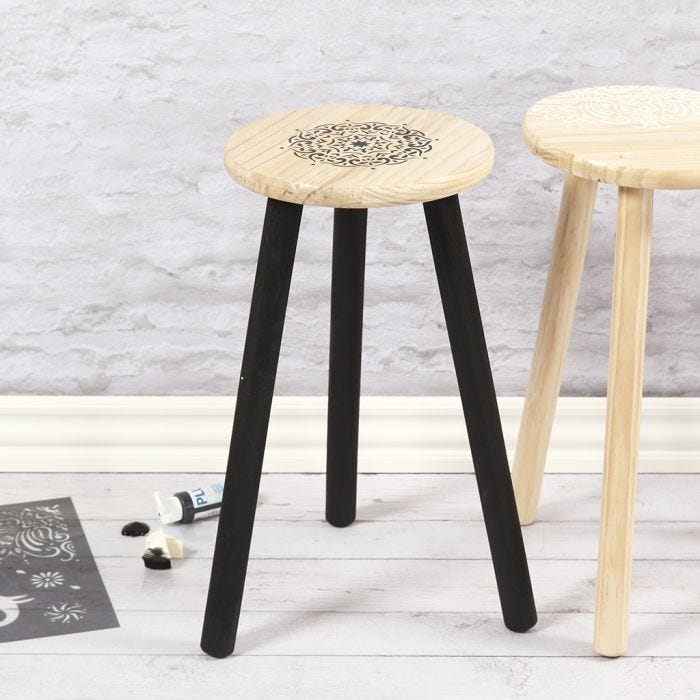 A wooden Stool decorated with Ethnic Patterns using a  Stencil