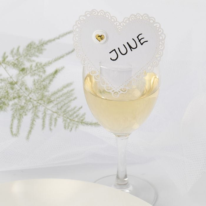 A heart-shaped Wedding Place Card with a Puffy Sticker