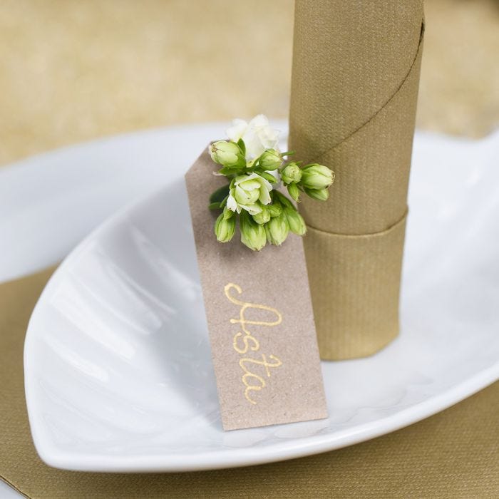 A Place Card from a Manilla Tag with a Flower for Decoration