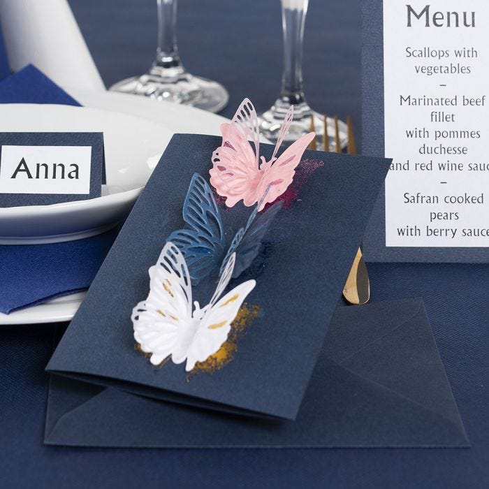 An Invitation with punched-out Butterflies and Deco Foil