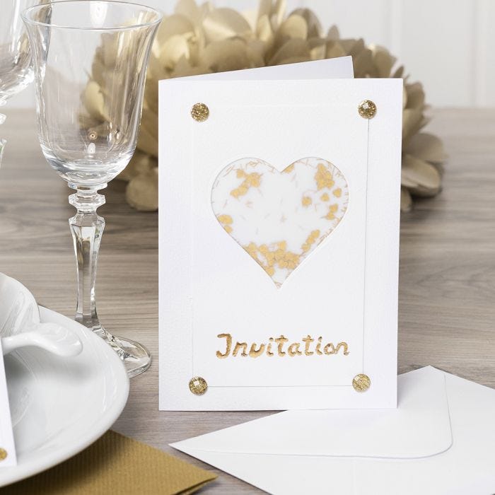 An Invitation decorated with a Vellum Paper Heart, Glitter, Rhinestones and Deco Foil