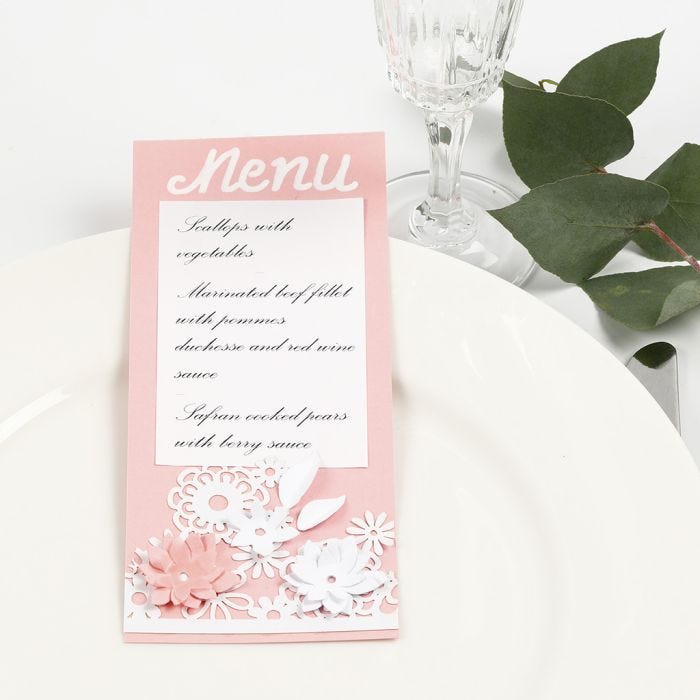 A Menu Card with Lace patterned Card and punched-out Flowers