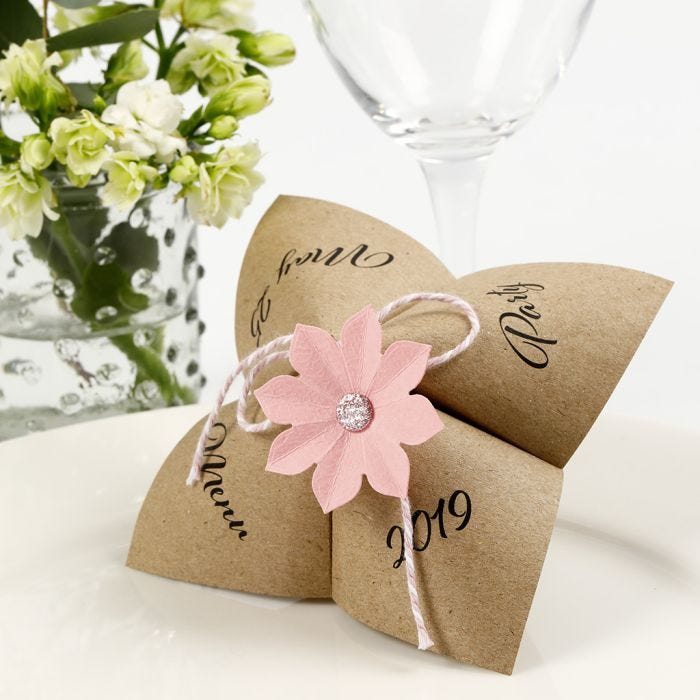 A Paper Fortune Teller Menu Card with a punched-out Flower