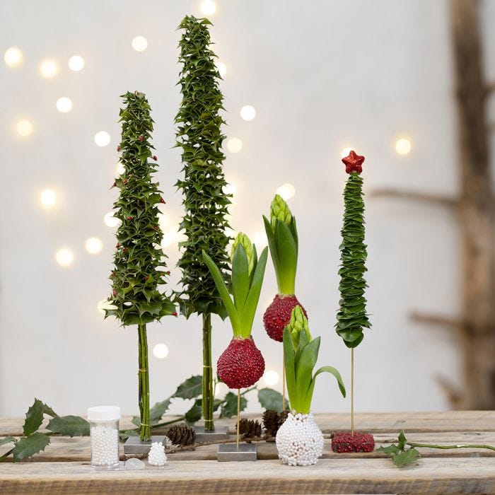 Christmas Trees and Christmas Decorations from real Greenery decorated with mini Glass Beads