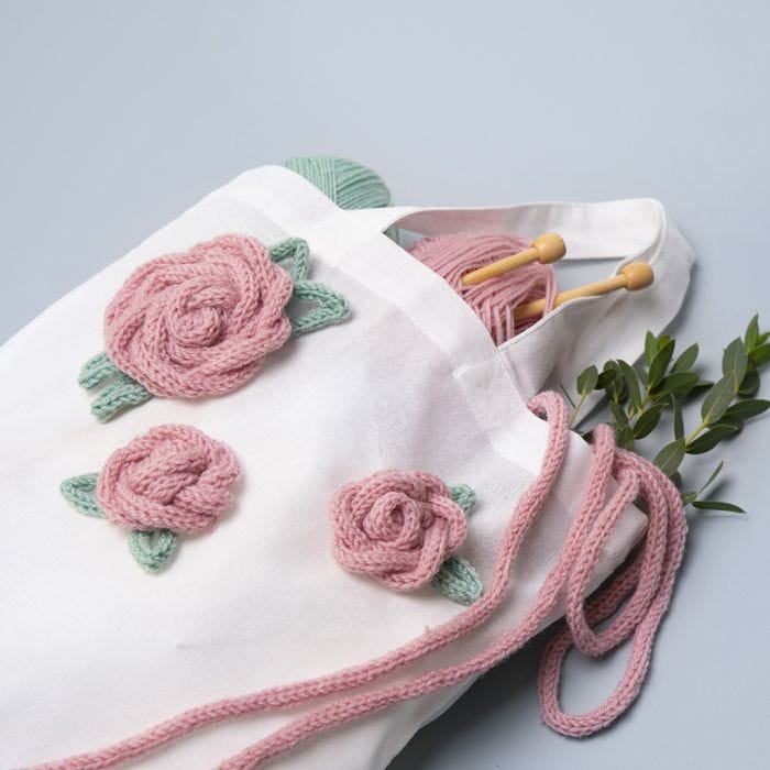 A Shopping Bag decorated with knitted Tube Roses