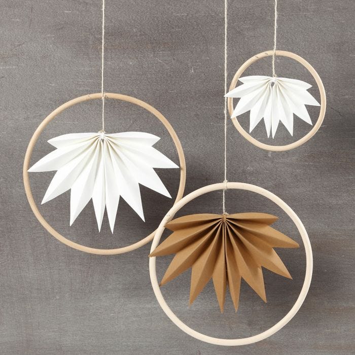 Hanging decorations made from bamboo rings and faux leather paper leaves