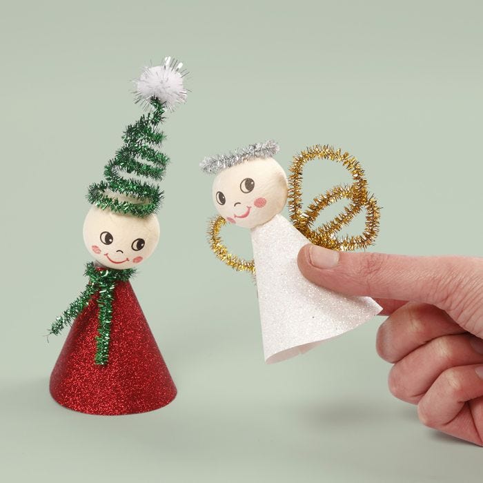 An elf and an angel from glitter design paper