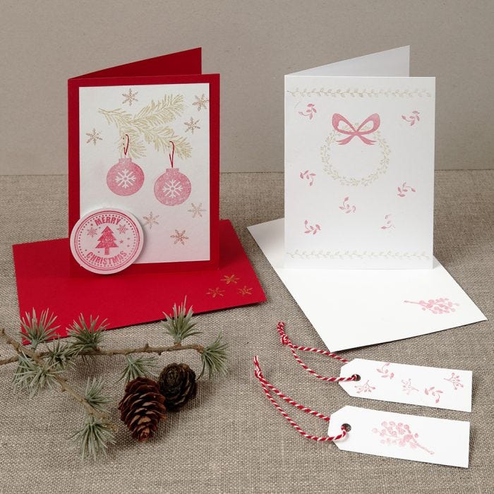 A Christmas card with stamped designs