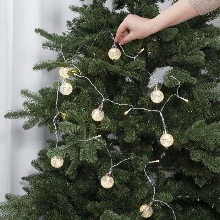 LED lights with glass baubles decorated with artificial snow