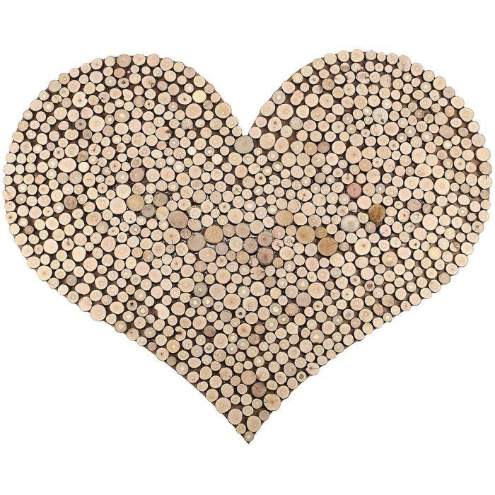 A large Heart with a Pattern made with wooden Discs