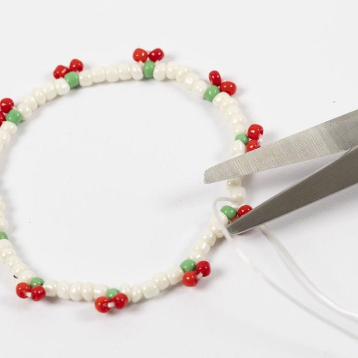 How to make cherries with rocaille beads on elastic cord