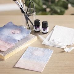 A picture from handmade paper colour-graded with art aqua liquid watercolour