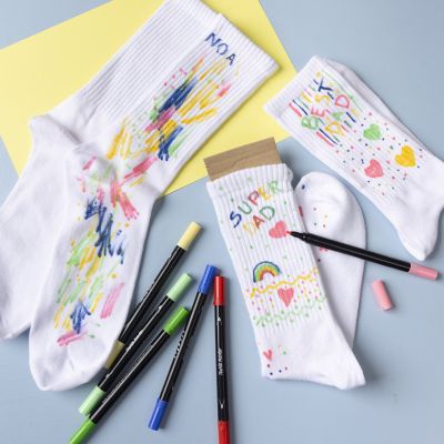 Personalised socks decorated with textile markers
