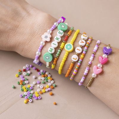 Bracelet with rocaille seed beads, letter beads and shaped wood beads