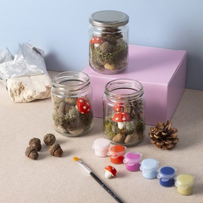 Autumn forest floor display in a jar
