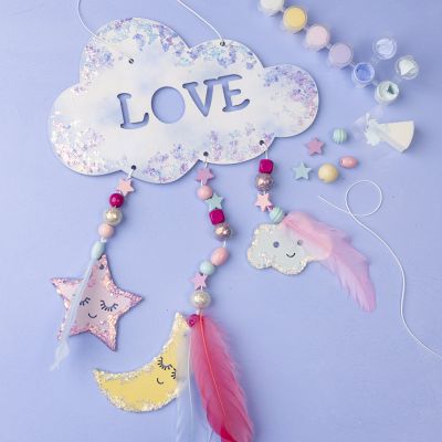 Sparkling mobile with clouds, moon and star
