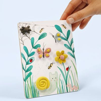 A picture with a natural design decorated with Silk Clay