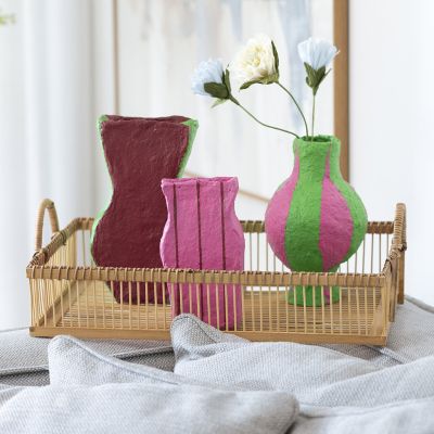Colourful vases in papier-mâché pulp