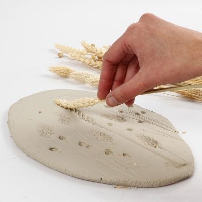 How to make imprints of flowers in self-hardening clay