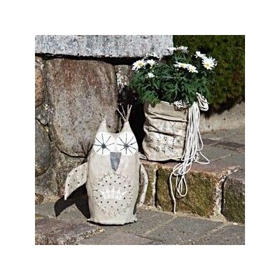 A decorative Owl and a Bag Vase for the Garden