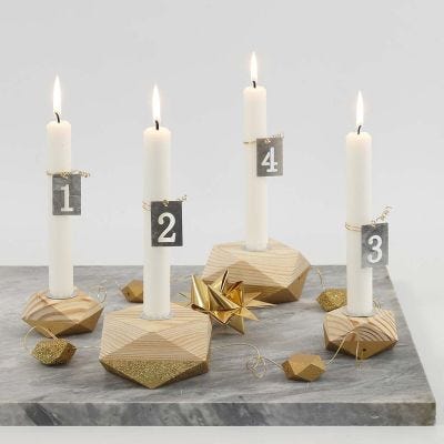 Four wooden Candle Holders for Advent partially painted in Gold