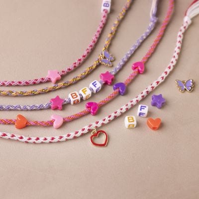 Friendship bracelet knotted using kumihimo technique
