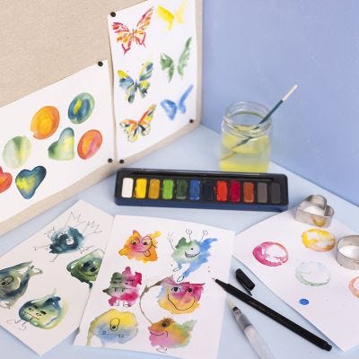 Paint imaginary figures and butterflies with watercolours