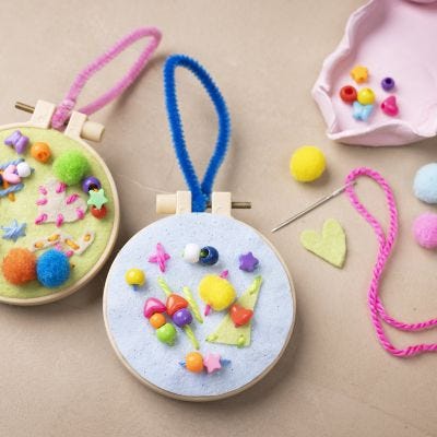 Embroidered hanging decoration with imaginative design