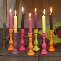 Dip candle made of paraffin wax with colour