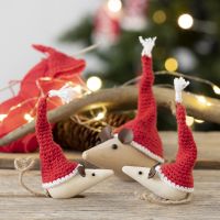 Crocheted mini elves' hats for wooden mice